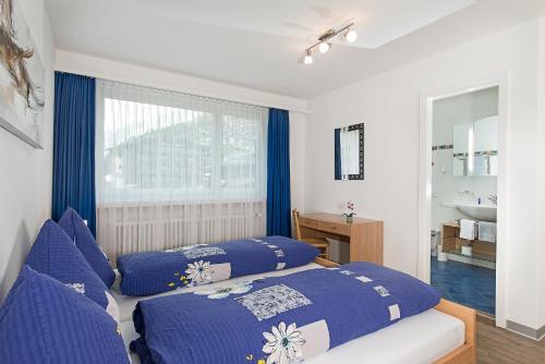 Postel nebo postele na pokoji v ubytování Haus Sonnmatt