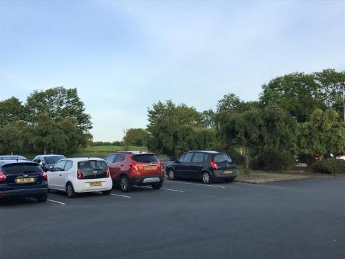 a group of cars parked in a parking lot at The Windmill Hotel in Elwick