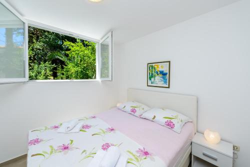 Postel nebo postele na pokoji v ubytování Apartment Sanja