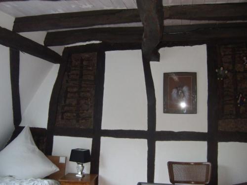 Een bed of bedden in een kamer bij Kleines Winzerhäuschen