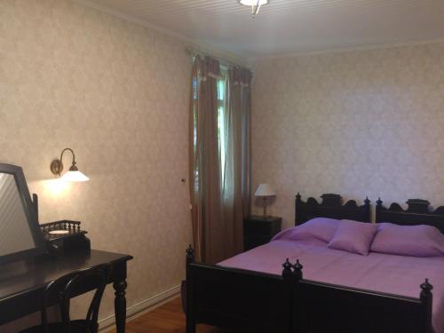 Postel nebo postele na pokoji v ubytování Mamma Mia Guest House