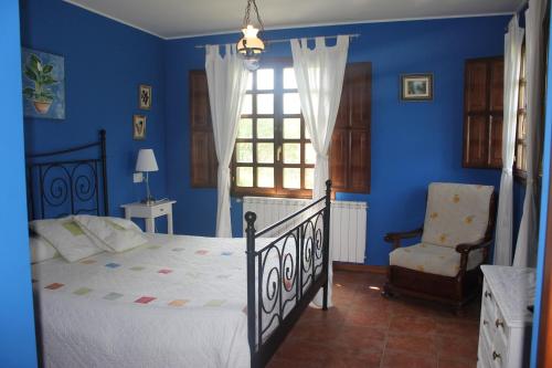 Tempat tidur dalam kamar di La Xana Ribadesella