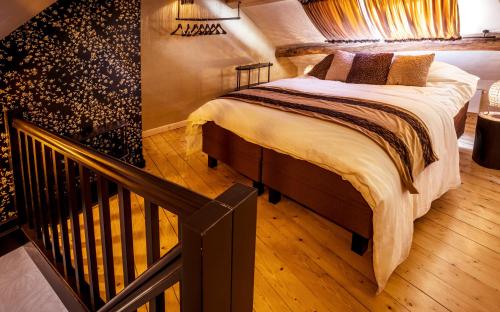 Postel nebo postele na pokoji v ubytování Maison Au Cheval Noir