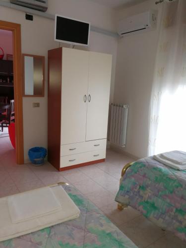 Katil atau katil-katil dalam bilik di Casa Vacanze Isabella