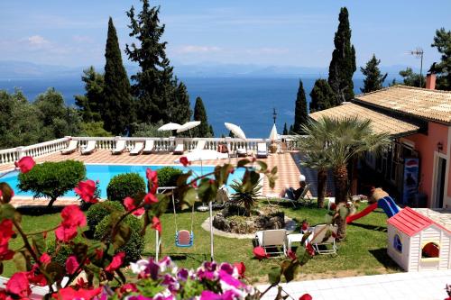 a view of the pool at a resort at Niki Sunrise Apartments in Gastourion