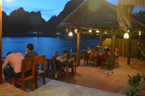 A restaurant or other place to eat at Phong Nha Coco House
