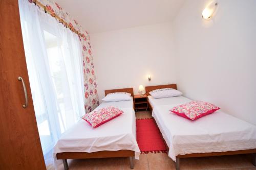 Postel nebo postele na pokoji v ubytování Apartment Prancic