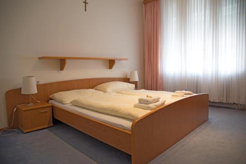 Voodi või voodid majutusasutuse Hotel Sonnenhof toas
