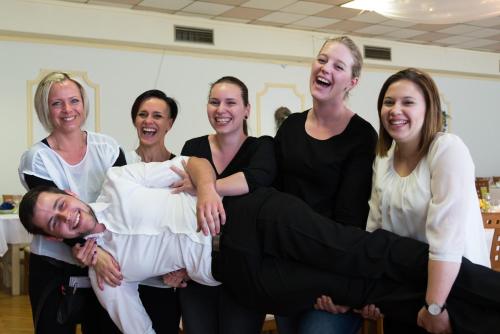 a group of women posing for a picture with a bride at Hotel Sonnenhof in Schattendorf