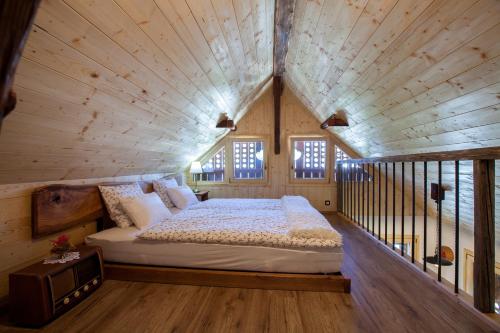 Llit o llits en una habitació de Barn House MM