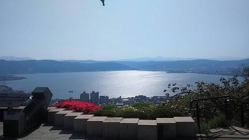 a view of a large body of water at Chambre dhote Tatami in Suwa