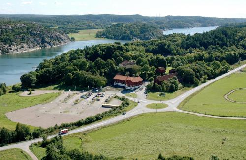 an aerial view of a building next to a river at Nordens Ark Hotell in Stranderäng
