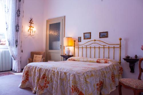 Ένα ή περισσότερα κρεβάτια σε δωμάτιο στο Villa Ruscone