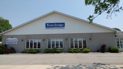 a building with a sign on the front of it at Travelodge by Wyndham Port Elgin in Port Elgin