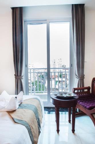 Ein Bett oder Betten in einem Zimmer der Unterkunft Relax Hotel