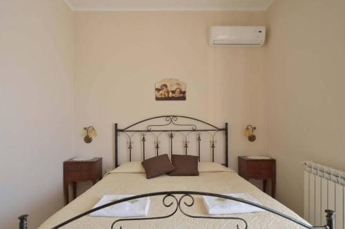 Postel nebo postele na pokoji v ubytování B&B Terra del Sole Agrigento San Leone