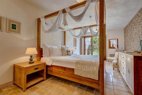 Säng eller sängar i ett rum på Alacati Kapari Hotel - Special Category