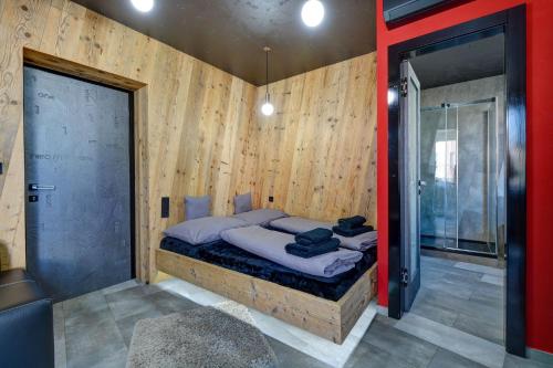 Postel nebo postele na pokoji v ubytování Apartmány ELISA