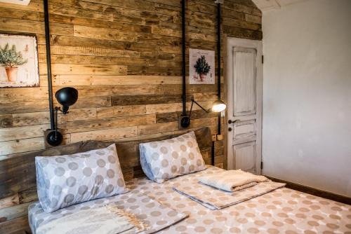 Katil atau katil-katil dalam bilik di Rosemarino Country House