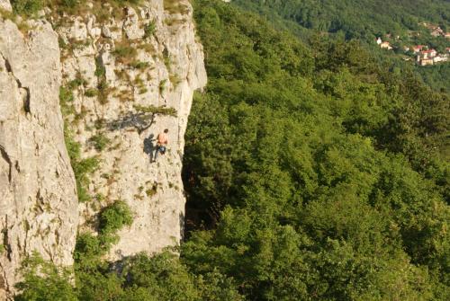 two people standing on the side of a mountain at Apartment Beautiful Črni Kal in Črni Kal