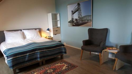 Katil atau katil-katil dalam bilik di De Gaanderij bed and Breakfast