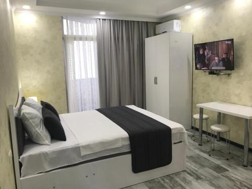 Ένα ή περισσότερα κρεβάτια σε δωμάτιο στο Selfie