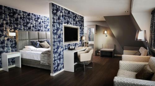 Postel nebo postele na pokoji v ubytování Bergstadens Hotel & Spa