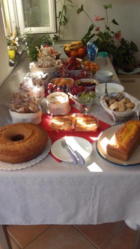 a table with many different types of food on it at B&B Celestina Ischia in Ischia