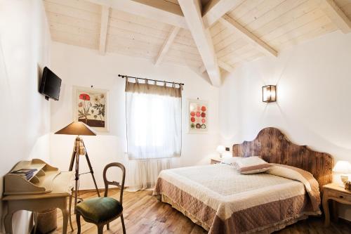 Postel nebo postele na pokoji v ubytování B & B I Ricordi