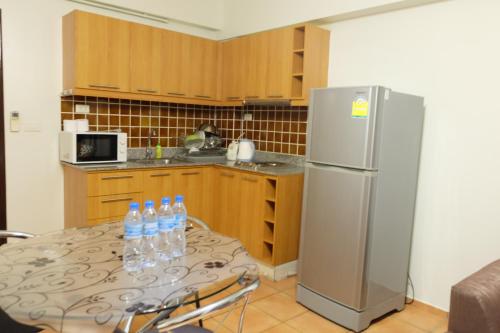 Η κουζίνα ή μικρή κουζίνα στο Lomsabai Apartments