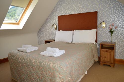 Postel nebo postele na pokoji v ubytování Culzean House