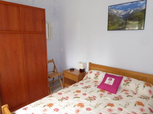 Ein Bett oder Betten in einem Zimmer der Unterkunft Les Berges Du Gave D'azun