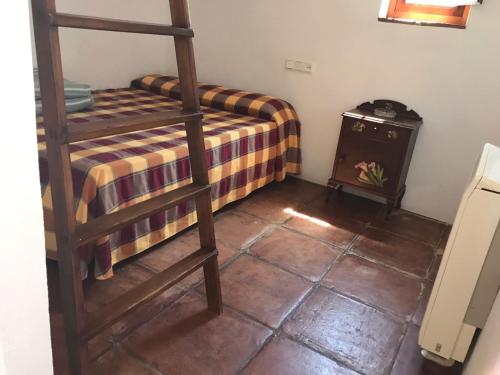 Giường trong phòng chung tại Cortijo Nuevo Alojamiento Rural