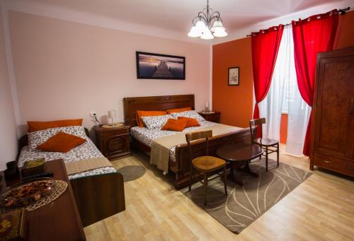 Postel nebo postele na pokoji v ubytování Phiros B&B
