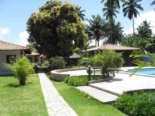 Κήπος έξω από το Village Miramar