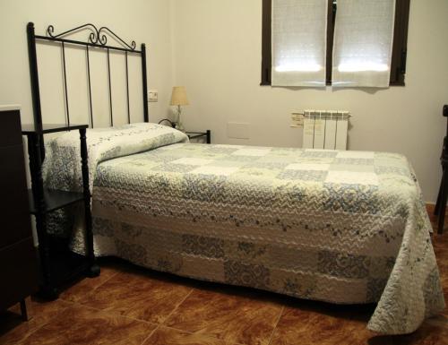 Ένα ή περισσότερα κρεβάτια σε δωμάτιο στο Hostal pachin