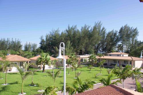 a view of the house from the garden at Ananta Hotel in Las Casitas