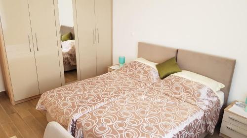 Postel nebo postele na pokoji v ubytování Villas Simag