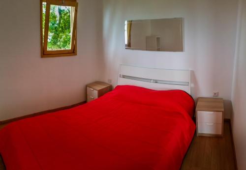 Tempat tidur dalam kamar di Intact Farm Resort