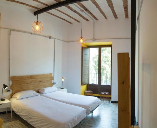 Llit o llits en una habitació de Green River Hostel