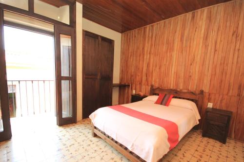 Кровать или кровати в номере Casa Madero