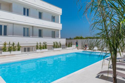Πισίνα στο ή κοντά στο Calura Residence
