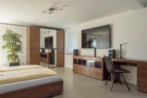 Katil atau katil-katil dalam bilik di Ferienwohnung Buchenberg