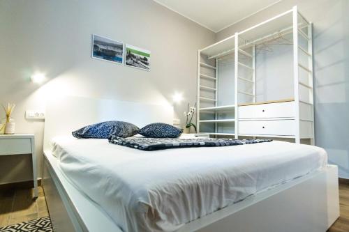 Un pat sau paturi într-o cameră la Apartments Lanča
