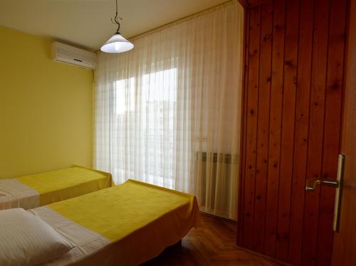 Apartments "Ruža" 객실 침대