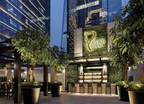 a view of a store with trees in front of it at The Langham, Shenzhen in Shenzhen