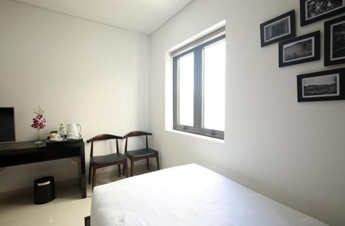 Cama o camas de una habitación en Dylan Hotel Danang