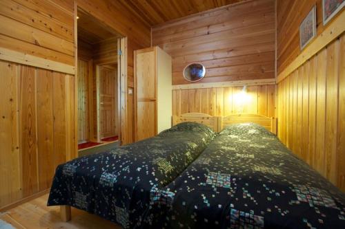 Ένα ή περισσότερα κρεβάτια σε δωμάτιο στο Hippu Apartment