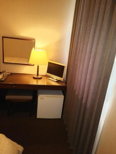 Télévision ou salle de divertissement dans l'établissement Hirosaki Grand Hotel