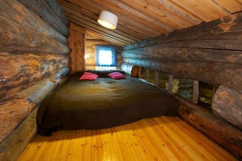 Ein Bett oder Betten in einem Zimmer der Unterkunft Rantaruka Apartment
